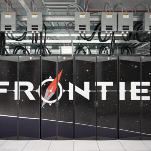 A forward-facing view of the Frontier supercomputer. It's outer facing cabinets are black with the word Frontier.