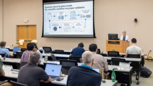 Gina Tourassi delivers a presentation on quantum computing and hybrid quantum-HPC workflows to attendees during the Quantum Computing User Forum (QCUF) 2026 at Oak Ridge National Laboratory on July 24, 2026.